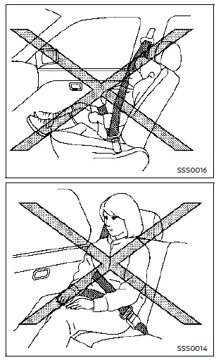 Nissan Rogue : exemple d’ajustement de la ceinture de sécurité (ceinture-baudrier sur l’épaule, sangle basse sur les hanches)