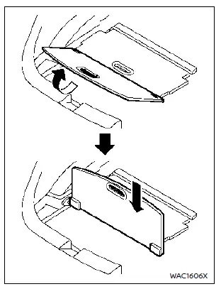 Mise en place de la séparation verticale dans le coffre du Nissan Rogue