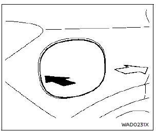 Illustration de la méthode d'ouverture par pression latérale sur la trappe à carburant du Nissan Rogue
